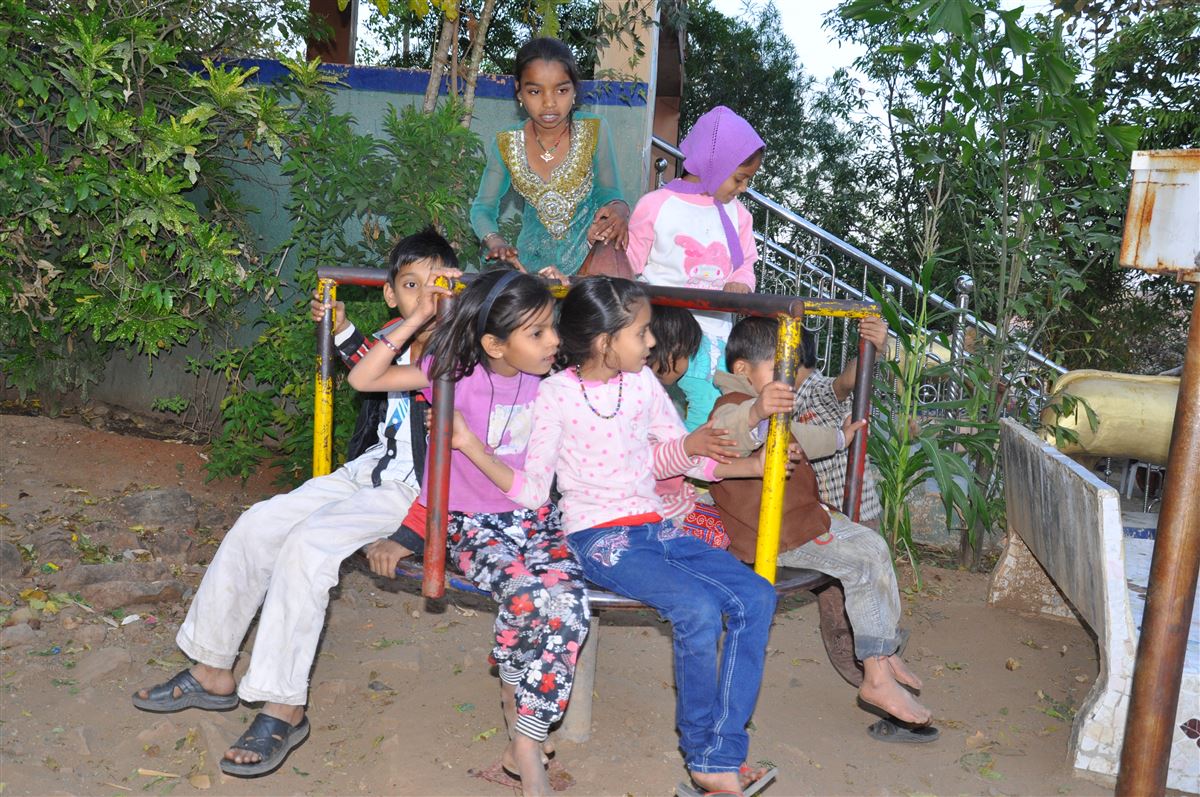 Children playing at the tirth's children's park